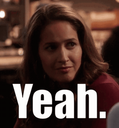 A Woman In A Red Shirt Says Yeah In White Letters GIF