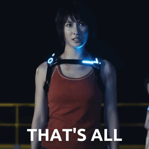 A Woman In A Red Tank Top Stands In Front Of A Sign That Says " That 'S All " GIF
