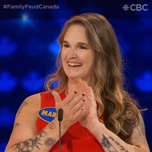 A Woman In A Red Tank Top With A Name Tag That Says Mar GIF