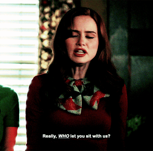 A Woman In A Red Top Says Really Who Let You Sit With Us GIF