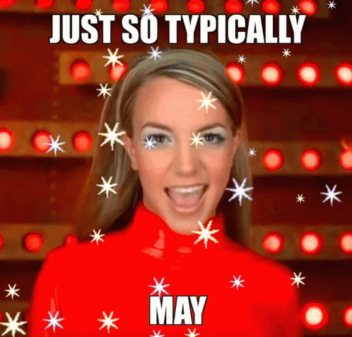 A Woman In A Red Turtleneck Is Surrounded By Snowflakes And Says Just So Typically May GIF