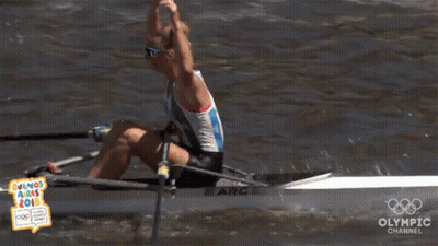 A Woman In A Rowing Boat With The Olympic Channel Logo GIF