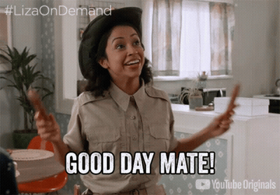 A Woman In A Safari Outfit Is Holding A Stick And Saying Good Day Mate GIF