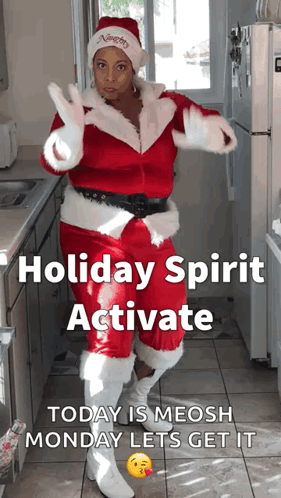 A Woman In A Santa Suit Is Dancing In A Kitchen With The Caption Holiday Spirit Activate Today Is Meosh Monday Lets Get  GIF