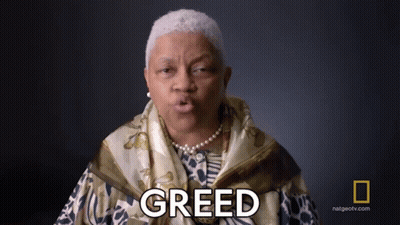 A Woman In A Scarf Says Greed In Front Of A National Geographic Logo GIF