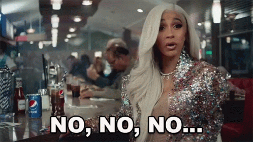 A Woman In A Sequined Dress Is Sitting At A Table In A Diner And Saying No , No , No . GIF