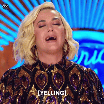 A Woman In A Sequined Dress Is Yelling At Someone GIF