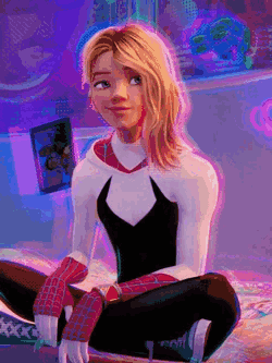 A Woman In A Spiderman Costume Is Sitting On A Bed . GIF