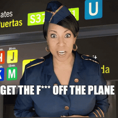 A Woman In A Stewardess Uniform Says Get The F * * Off The Plane GIF