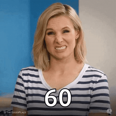 A Woman In A Striped Shirt Is Making A Funny Face With The Number 60 Written On Her Face . GIF