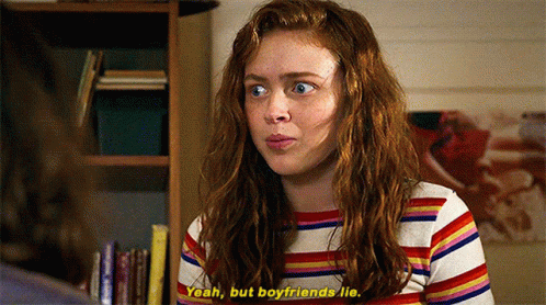 A Woman In A Striped Shirt Is Talking To Another Woman And Says Yeah But Boyfriends Lie . GIF