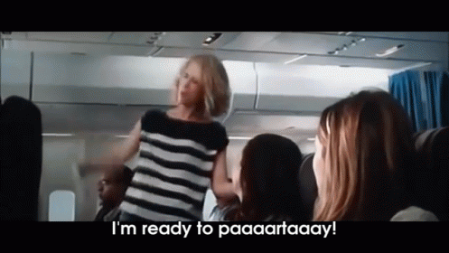 A Woman In A Striped Shirt Says I 'M Ready To Paaaartaay GIF