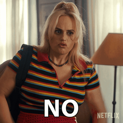 A Woman In A Striped Shirt Says " No " GIF