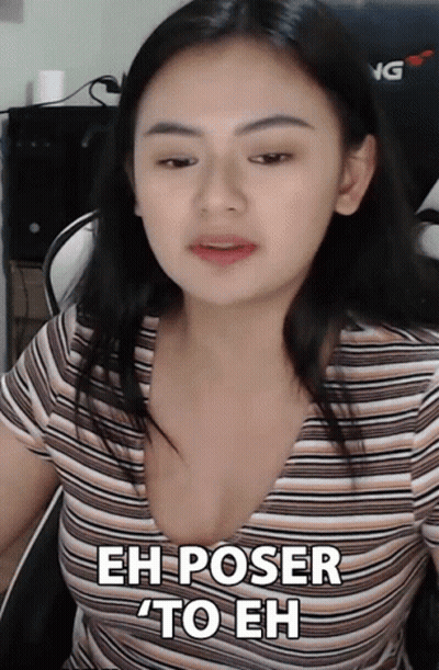 A Woman In A Striped Shirt With The Words Eh Poser To Eh Below Her GIF