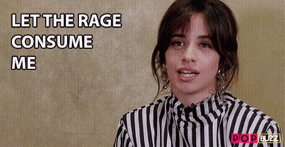 A Woman In A Striped Shirt With The Words Let The Rage Consume Me GIF