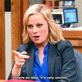 A Woman In A Suit And Blue Shirt Says " I Have An Idea " GIF