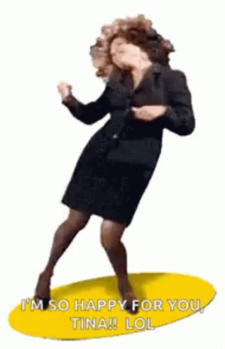 A Woman In A Suit And Skirt Is Dancing On A Yellow Circle With A Yellow Background . GIF