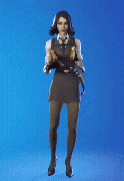 A Woman In A Suit And Tie Is Dancing With Her Hands In The Air GIF