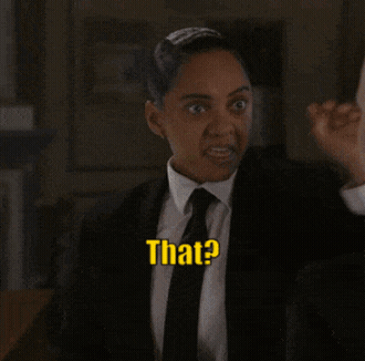 A Woman In A Suit And Tie Is Saying That GIF