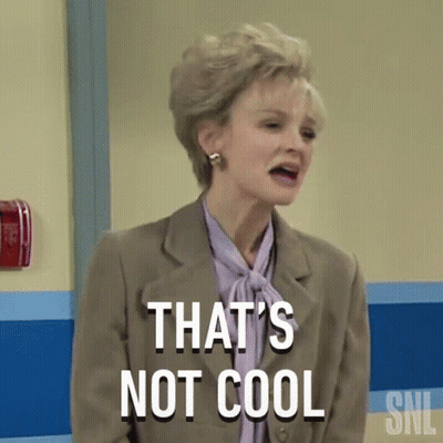 A Woman In A Suit And Tie Is Saying That 'S Not Cool . GIF