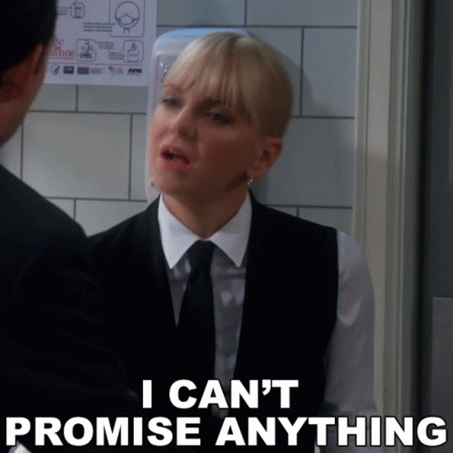 A Woman In A Suit And Tie Says " I Can 'T Promise Anything " While Talking To A Man GIF