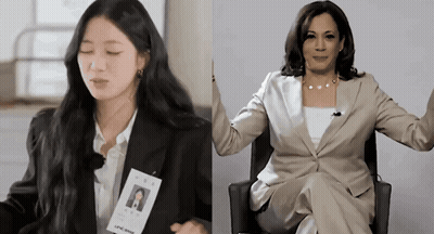 A Woman In A Suit Has A Badge With The Letter N On It Next To A Woman In A Suit GIF
