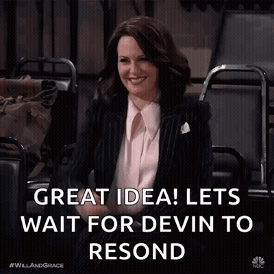 A Woman In A Suit Is Sitting In A Chair With The Words Great Idea Lets Wait For Devin To Resend Below Her GIF