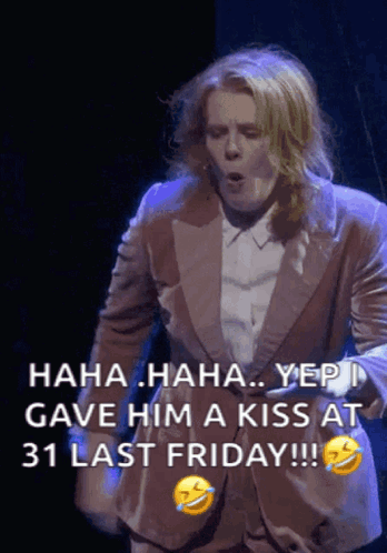 A Woman In A Suit Says " Haha Haha Yep Gave Him A Kiss At 31 Last Friday " GIF