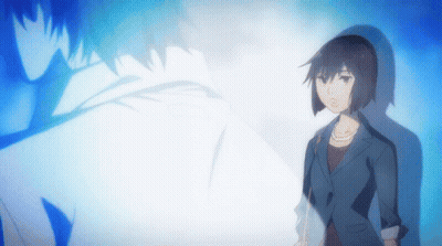 A Woman In A Suit Stands In Front Of A Blue Background GIF