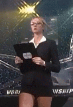 A Woman In A Suit Stands In Front Of A Sign That Says Worship GIF