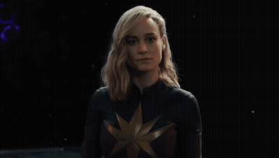 A Woman In A Superhero Costume Says Wanna Fight . GIF