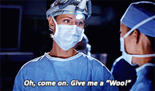 A Woman In A Surgical Gown Says " Oh Come On Give Me A " Woo " GIF