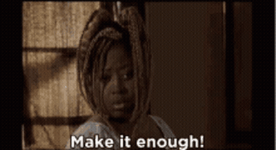 A Woman In A Towel Says Make It Enough . GIF