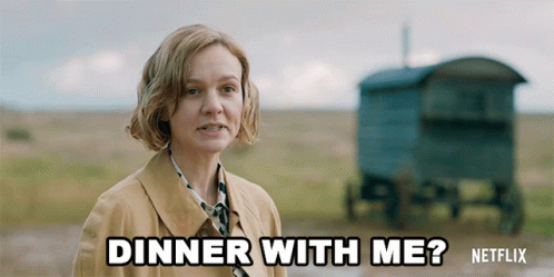 A Woman In A Trench Coat Is Saying Dinner With Me GIF