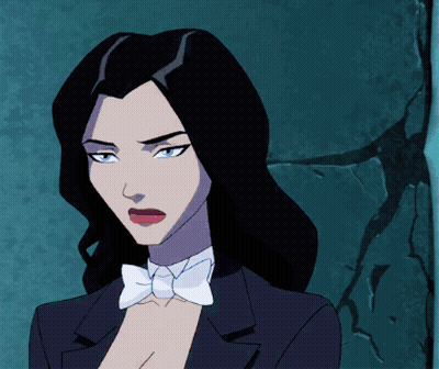 A Woman In A Tuxedo With A Bow Tie GIF