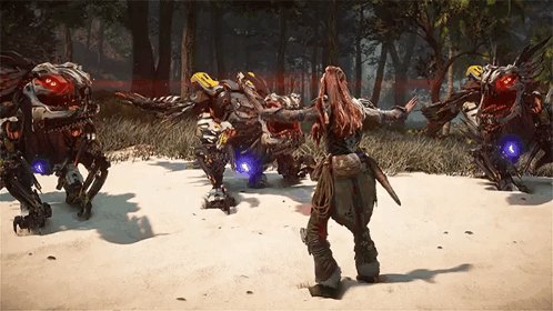 A Woman In A Video Game Is Standing In Front Of A Group Of Monsters GIF
