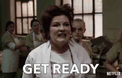 A Woman In A White Apron Says Get Ready On A Netflix Ad GIF