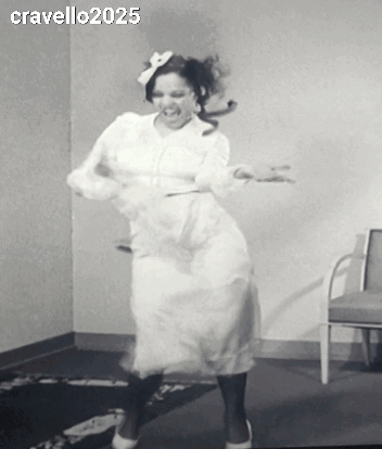 A Woman In A White Dress Is Dancing In A Black And White Photo Taken By Cravello 2025 GIF