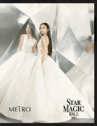 A Woman In A White Dress Is On The Cover Of The Star Magic Ball Magazine GIF