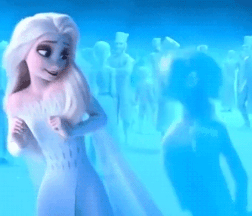 A Woman In A White Dress Is Standing In Front Of A Crowd Of People In A Blue Room . GIF
