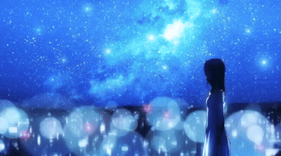 A Woman In A White Dress Stands In Front Of A Starry Sky GIF