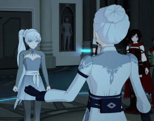 A Woman In A White Dress Stands Next To Another Woman In A Grey Dress GIF