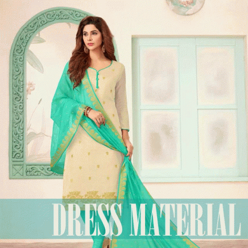 A Woman In A White Dress With A Blue Dupatta Stands In Front Of A Window With The Words Dress Material Below Her GIF