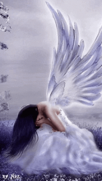 A Woman In A White Dress With Angel Wings Is Kneeling Down GIF