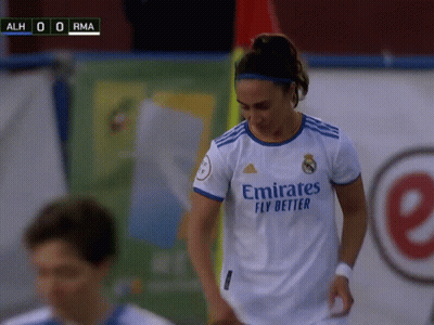 A Woman In A White Emirates Fly Better Jersey GIF