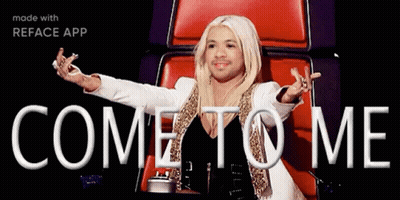 A Woman In A White Jacket Is Sitting In A Red Chair With Her Arms Outstretched And The Words Come To Me Above Her GIF