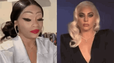 A Woman In A White Shirt And A Lady Gaga In A Black Dress Are Making Funny Faces . GIF