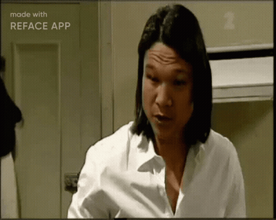 A Woman In A White Shirt Is Making A Funny Face And Is Made With Reface App GIF