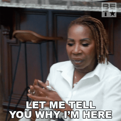 A Woman In A White Shirt Is Saying Let Me Tell You Why I 'M Here GIF