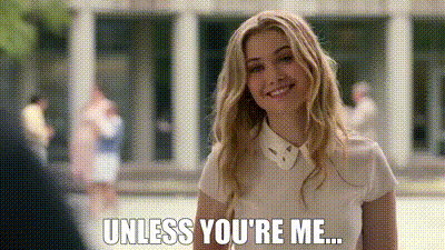 A Woman In A White Shirt Is Smiling And Saying `` Unless You 'Re Me ... '' GIF